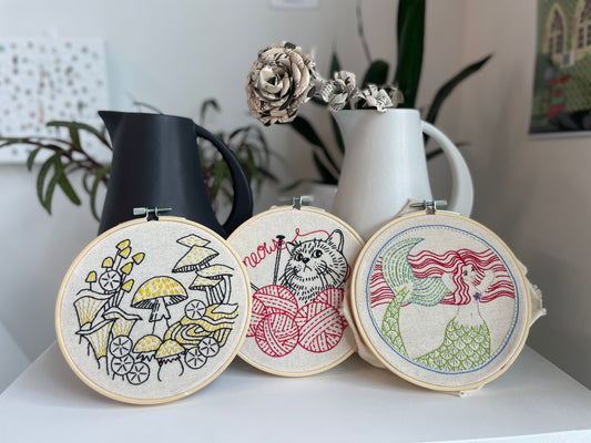 Three Embroideries and Stoneware vases