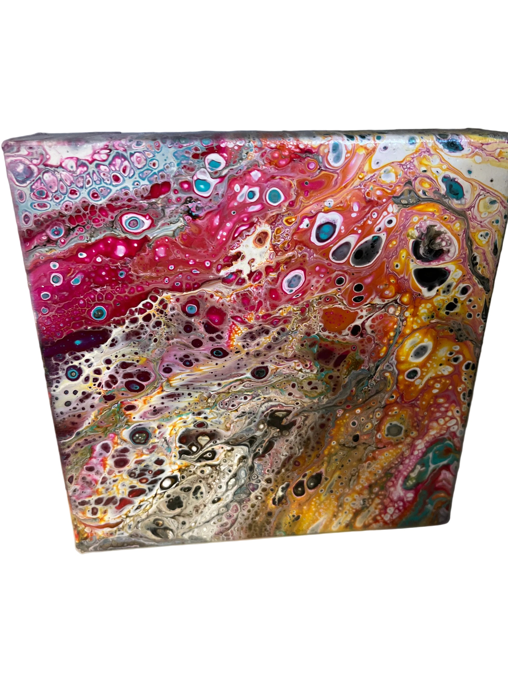 Colourful poured art on canvas