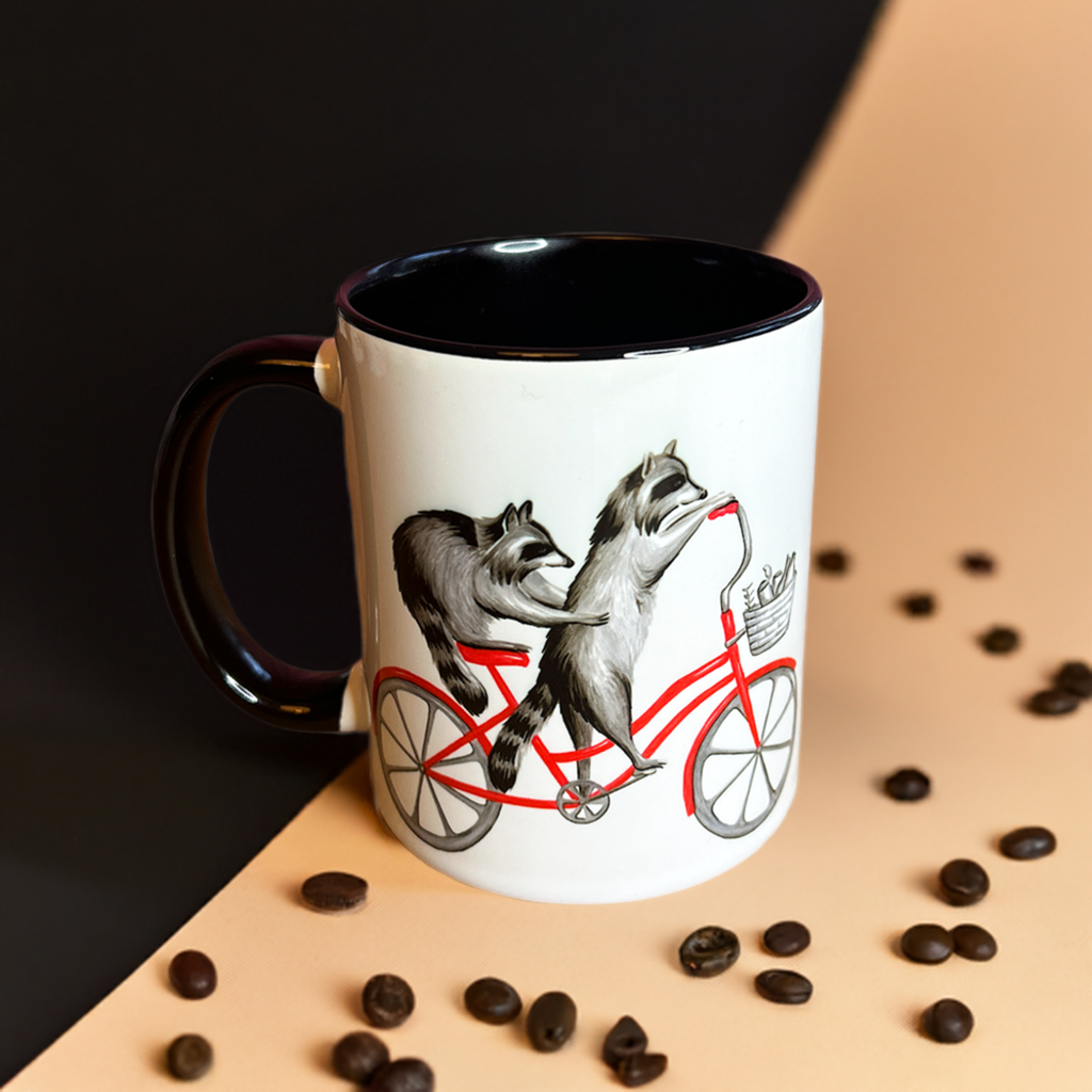 Raccoons riding a Bike Mug